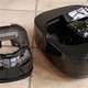 A pop-up handle makes it easy to remove and empty the Coral One’s dust bin, but the shiny black plastic housing makes it hard to know when it’s full.